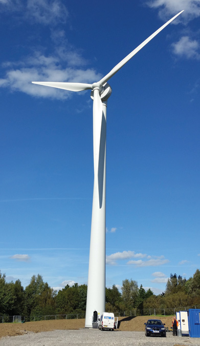 Completed wind turbine being commissioned - Courtesy of Arup.
