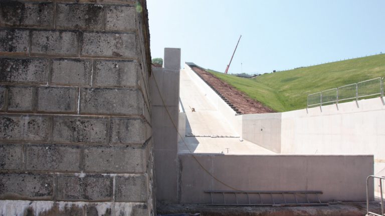 Completed view of new RC spillway - Courtesy of Skanska UK