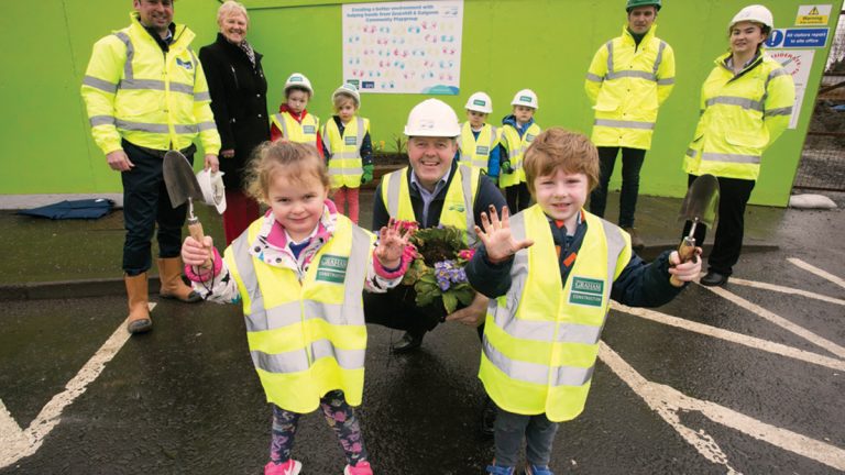Children from Gracehill & Galgorm Community Playgroup helping to brighten up the site with plants - Courtesy of NI Water