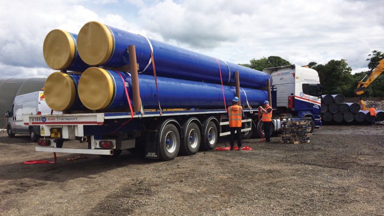 Pipes to be offloaded at site - Courtesy of Caledonia Water Alliance