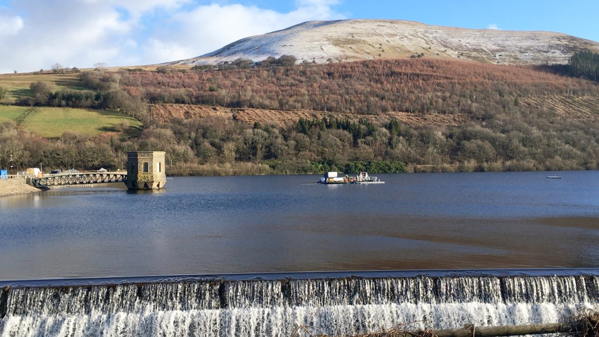 Talybont Reservoir with draw-off tower & broad crested weir - Courtesy of Dŵr Cymru Welsh Water