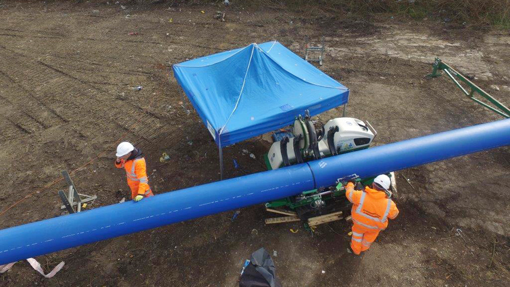 The polyethylene pipe is butt welded and the external bead removed. Butt welded joints are virtually the same strength as the pipe - Courtesy of Northumbrian Water Limited