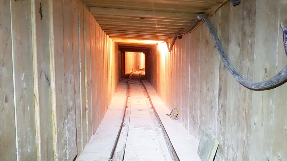Some tunnels required extensive timber headings due to very poor condition - Courtesy of TPMD