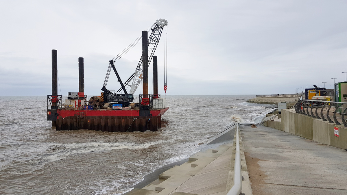 Jack-up barge and temporary marine cofferdam during high tide - Courtesy of United Utilities