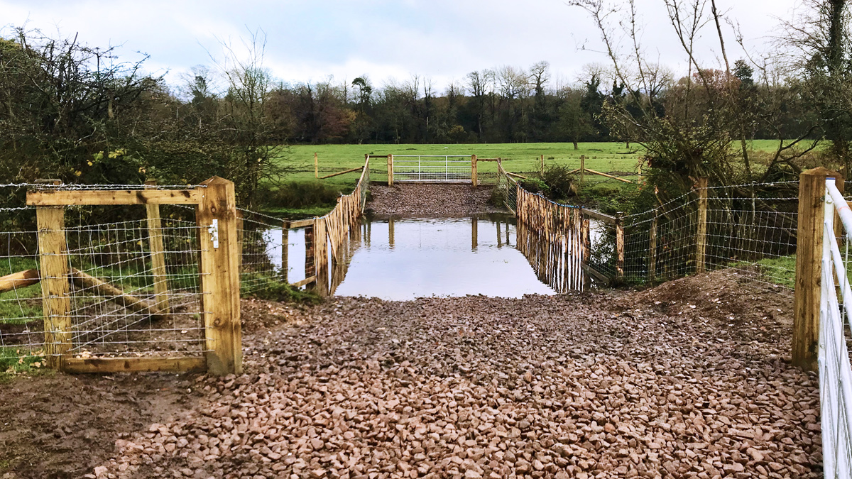 Figure 7: Photo of a cattle crossing point with field gates and water gates - Courtesy of Affinity Water