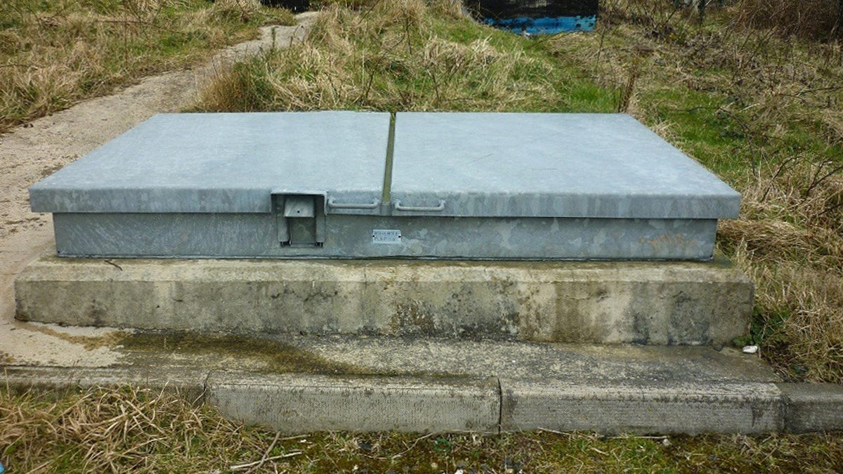 Raised cover over borehole - Courtesy of Doran Consulting