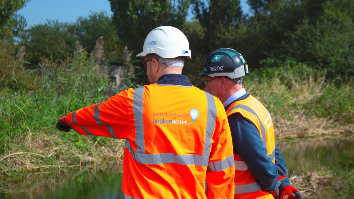 Site manager reviewing vegetation clearance - Courtesy of Anglian Water @one Alliance