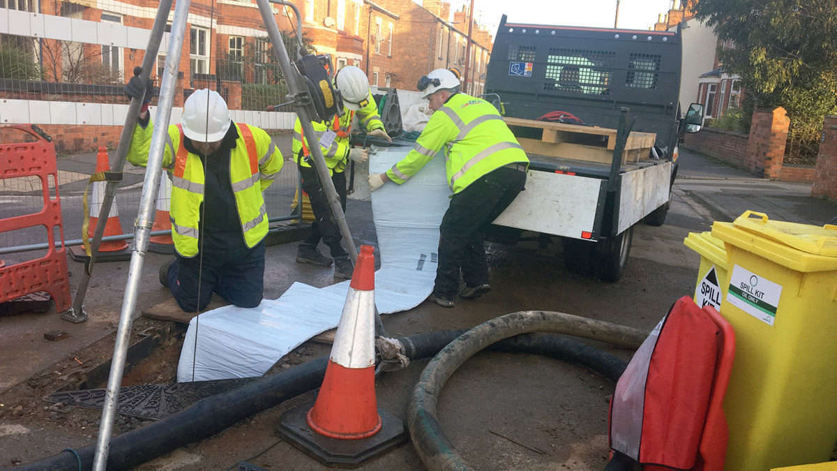 Liner being inserted into sewer, winched from next manhole, prior to inflation and curing - Courtesy of Severn Trent
