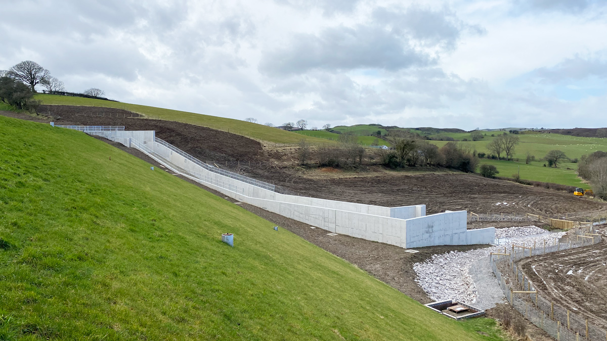 The completed spillway with landscaping on-going - Courtesy of MMB