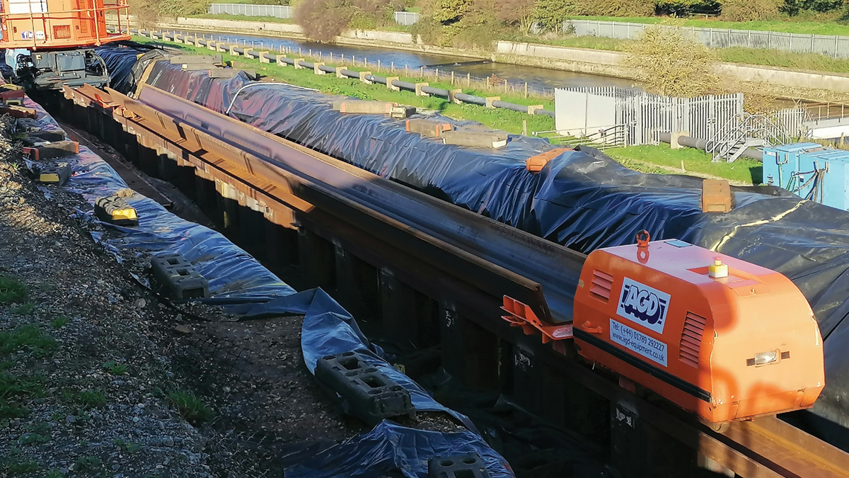 Train moving a pile to the clamp crane - Courtesy of MWH Treatment