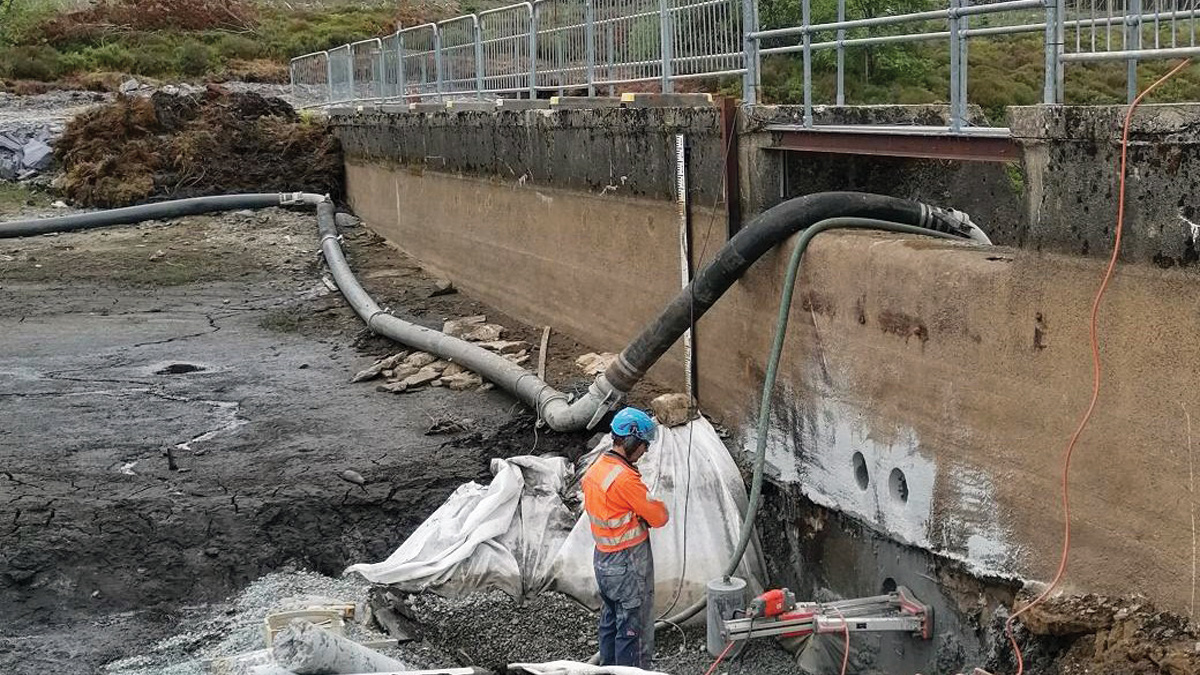 Cores being drilled through concrete dam to allow any extreme storm flows to pass through - Courtesy of Welsh Water