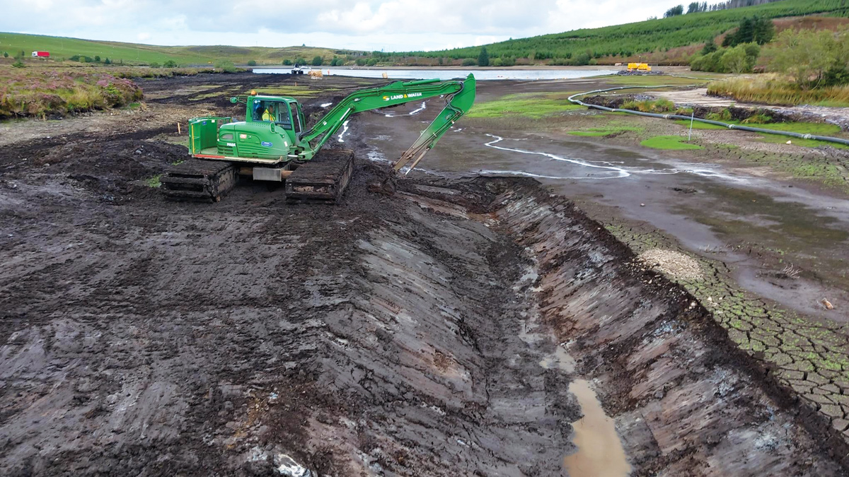 Amphibious excavator forming the new channel connecting to the downstream watercourse - Courtesy of Welsh Water
