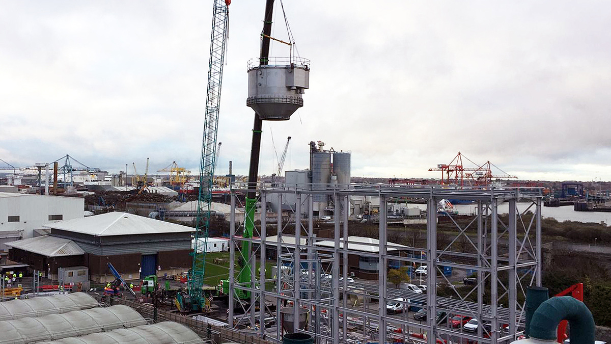 Reactor vessel lift into partially completed structural frame - Courtesy of Murphy Ireland