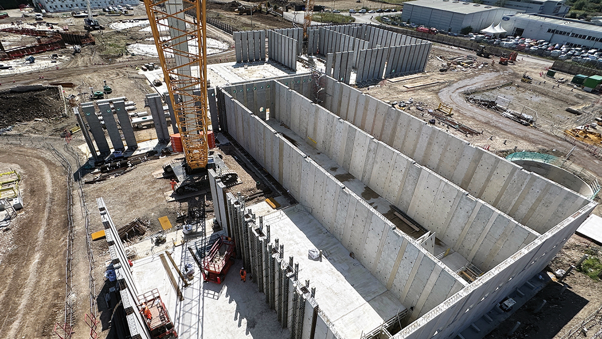 (foreground) PST precast walls with concrete stitches and bases and (background) ASP precast walls - Courtesy of Bam Nuttall Ltd