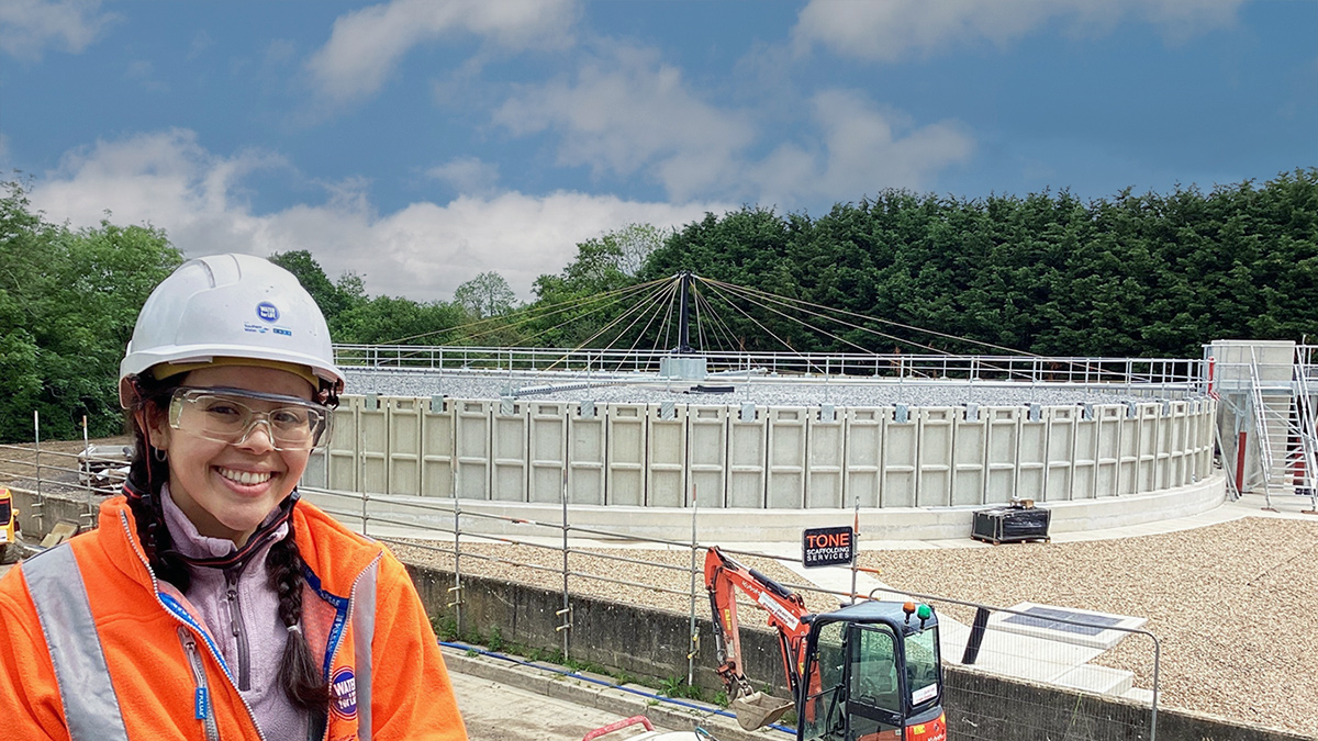 Project Engineer Xenia Magdaleno-Tseng in front of the new trickling filter bed - Courtesy of CMDP