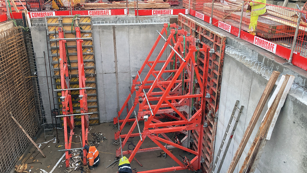 Single sided reinforced concrete wall pours against secant piles to form internal tank walls - Courtesy of Dawson WAM