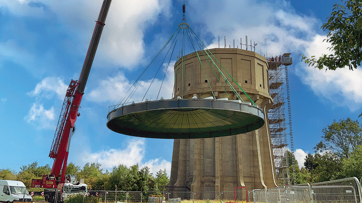 The new water tower roof being lifted into place - Courtesy of @one Alliance