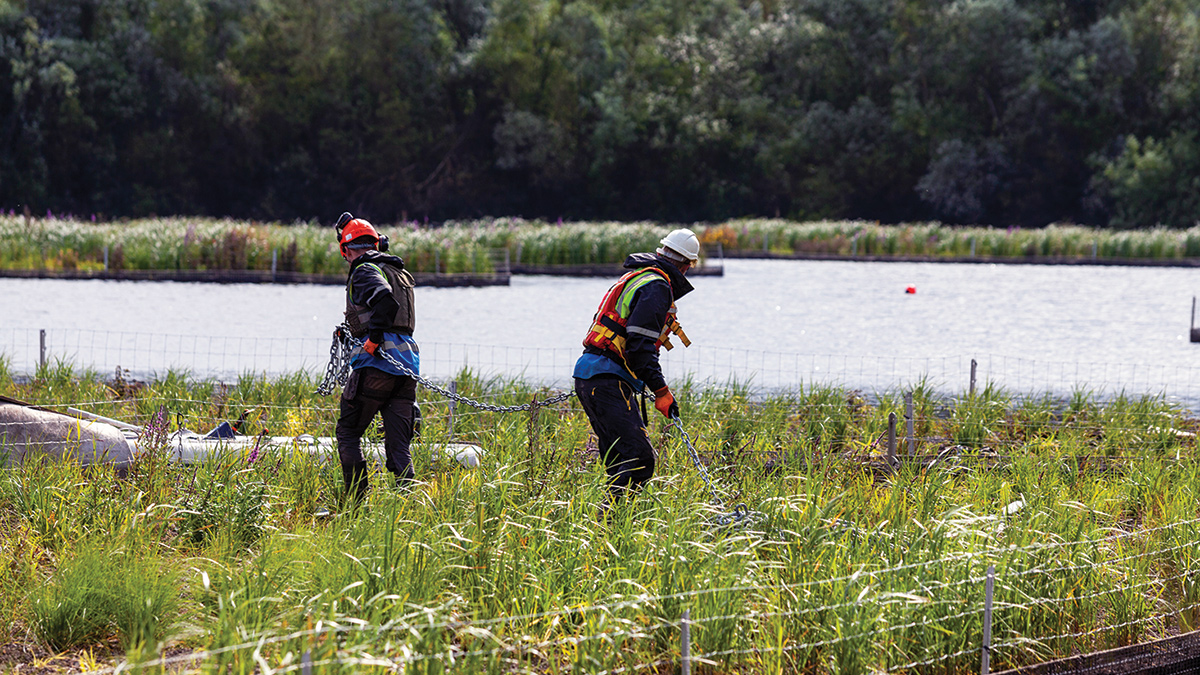 Installing the floating wetlands - Courtesy of Matthew Nichol Photography