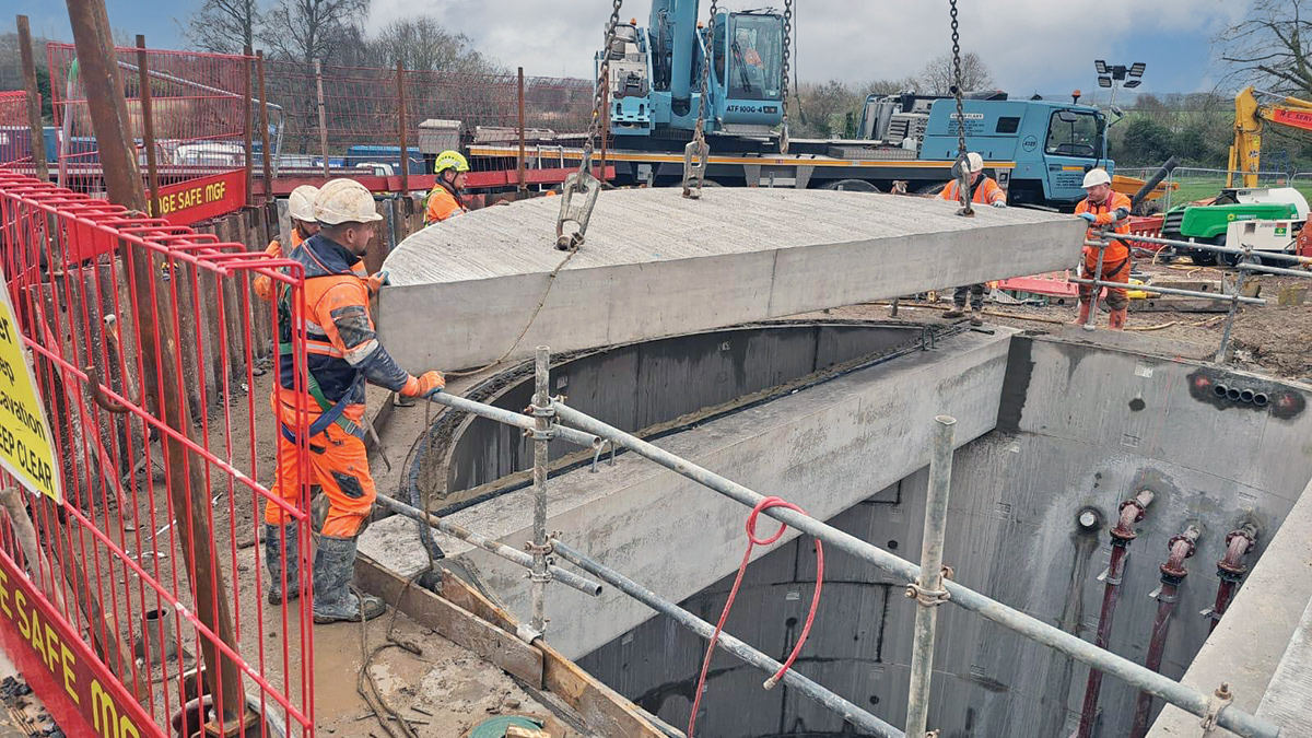 Placing the cover slab - Courtesy of Bartlett Contractors Ltd