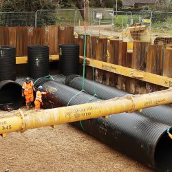 Installation of the five rows of 1500mm diameter Weholite pipes within the cofferdam - Courtesy of Anglian Water’s @one Alliance