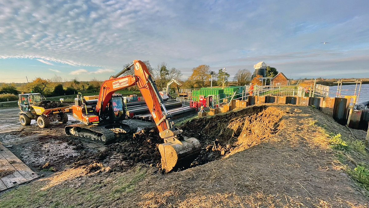 Excavation of flood embankment following installation of temporary piling - Courtesy of Water Management Alliance