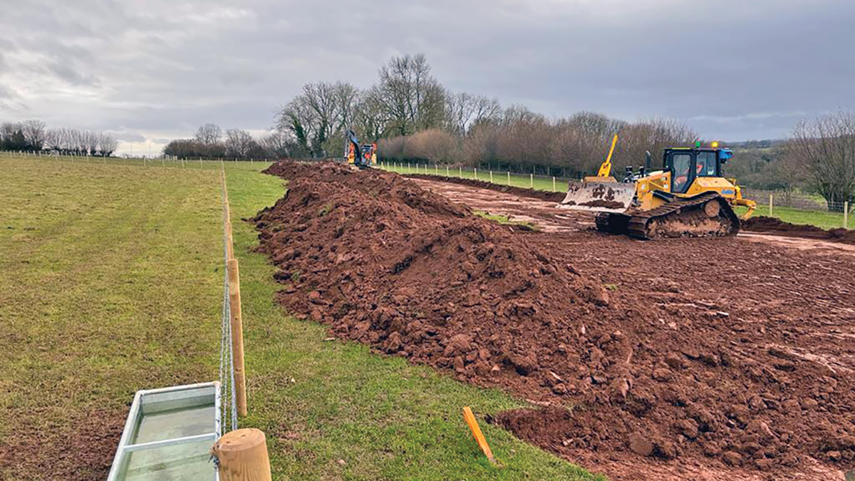 Easement fenced and topsoil stripping underway with geo-referenced UAV position in foreground - Courtesy of Coffey Construction UK