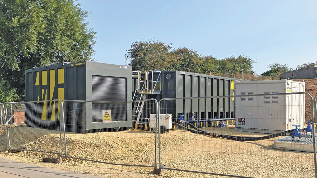 Temporary sludge tanks from TerraTank Ltd located near site entrance - Courtesy of Mott MacDonald Bentley