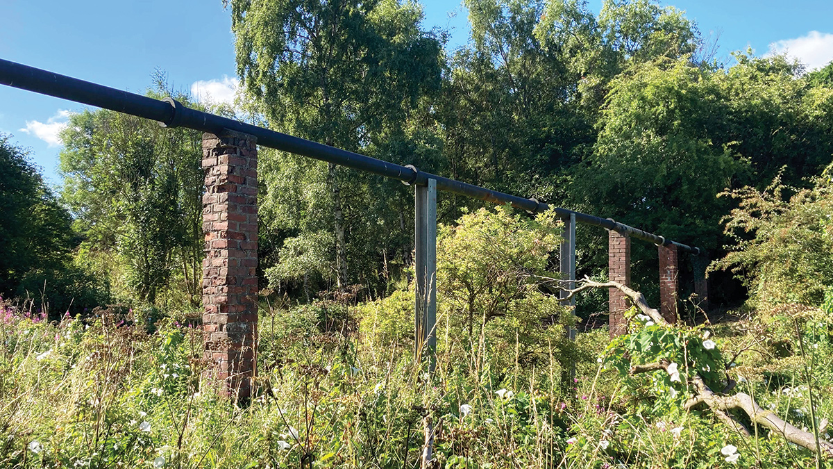The existing pipe bridge was a major challenge to the project team and was removed as part of the project design - Courtesy of Esh Stantec