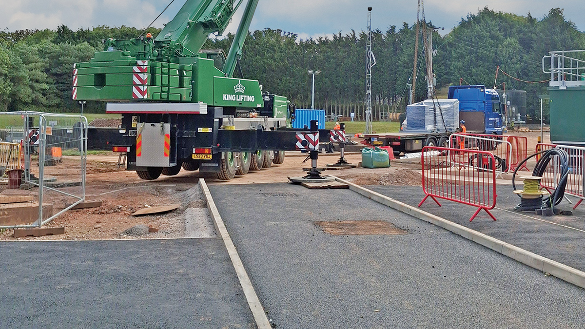 Asphalt hardstanding being laid in place of a concrete base - Courtesy of BIMTek Limited