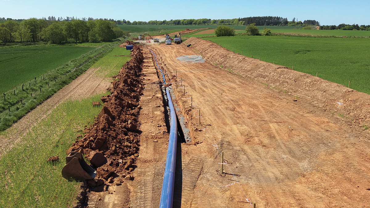 Pipe installation - Courtesy of Caledonia Water Alliance