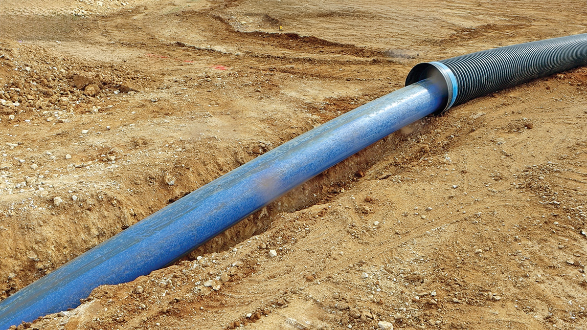 Installation of PE pipe within a protective sleeve - Courtesy of @one Alliance