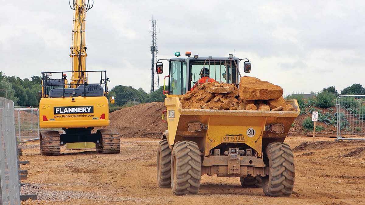 Excavated material being loaded and transported around the site - Courtesy of @one Alliance