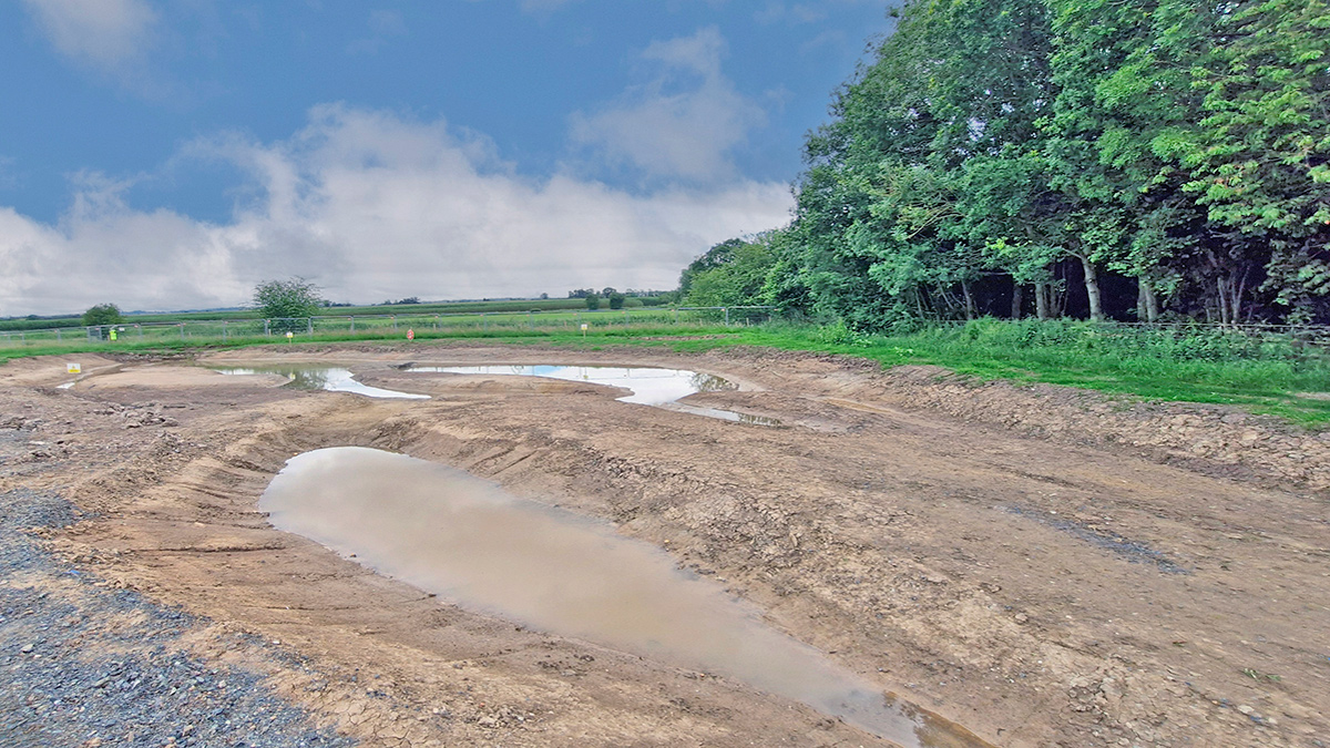 The wildlife pond under construction with the upper shallow side slopes evident - Courtesy of Mott MacDonald Bentley