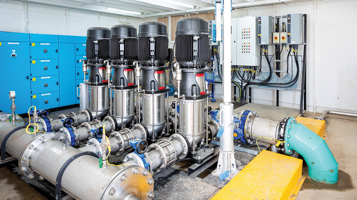 Inside the new booster station: 4-pump Grundfos skid tied onto riser pipework with individual pump controls and MCC - Courtesy of Esh Stantec