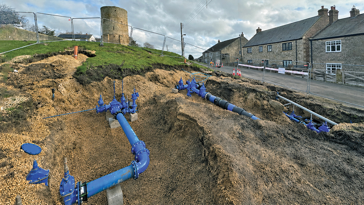 New pipework connecting to the network in Westerton Village Green (1765 Thomas Write Observatory in the background) - Courtesy of Esh Stantec